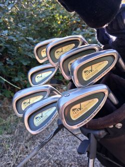 Golf clubs + Sun Mountain bag