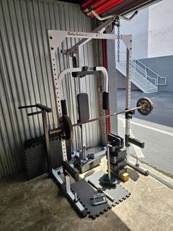 Body-Solid Power Rack with Lat Pulldown-Weights + Accessories+ carpets. Zip 33032
Delivery fee

Durable steel Body-Solid power rack is white with blac