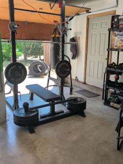 Power Rack with Flat Bench and Weight Plates