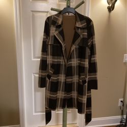 Patterned Rain Coat In Blocks Of Black Cream And Pale Olive 