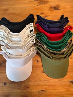 25 visors/caps/hats never worn