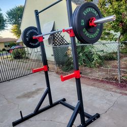 Rack  + Barbell + 100 lb  **$350** New 