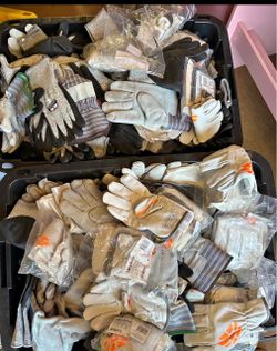 two boxes full of Work gloves