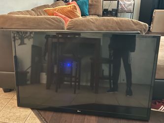 LG Flat screen with wall mount