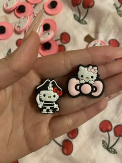 Hello kitty croc charms 