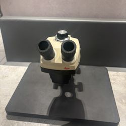 Leica StereoZoom 4 microscope 0.7-3X power W/10XW.F. and Manico M445 base