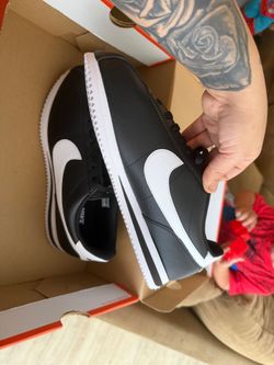 Black leather Nike cortez