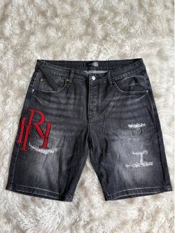 Amiri black acid washed Jorts.