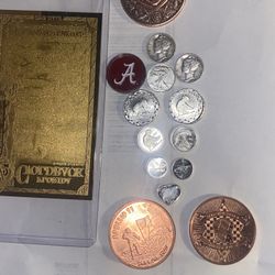 124 karat half Florida go back to 1/4 ounce silver prospector rounds to 1/10 ounce prospector rounds a couple other civil rounds and includi including