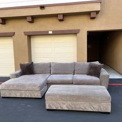 Living Spaces Gray Sectional Sofa + Ottoman – Clean & Spacious 