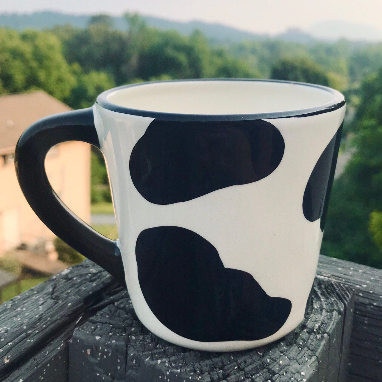cow mug with figurine