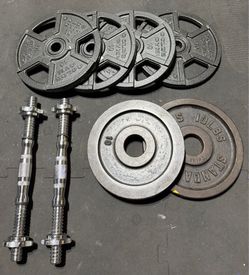 6x 10lb plates and 2 Dumbbell Handles