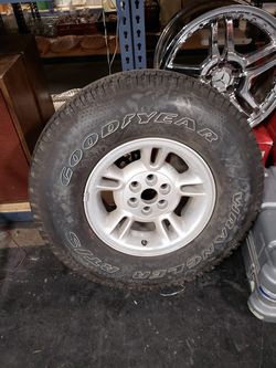 (1) Slightly used Goodyear Wrangler RT/S 31x10.5 x R15 Tire and Rim