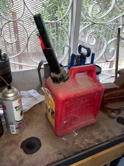 Black & Red Gas Canister Gasoline Tool