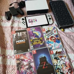 2023 OLED Nintendo Switch V3 256GB all white with white dock, case, charger & 0 Games for $230! Free Delivery In person. $40! Per Game & $80 racing wh