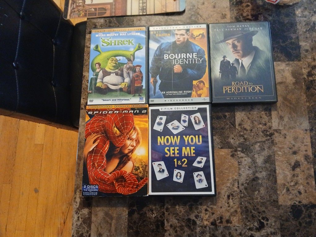 DVD Movies And Great Condition SHREK, THE BOURN INDENTITY ,ROAD TO PERDITION SPIDER-MAN 2 AND NOE YOU SE ME 1&2