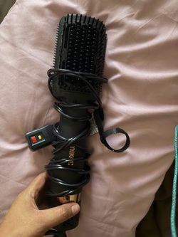 Amika hair comb dryer tool