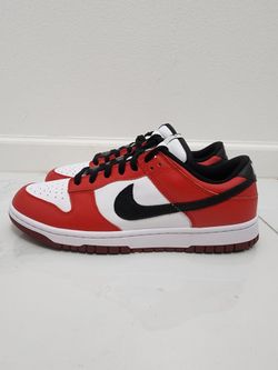 New Nike Dunk Low By You sneakers feature a classic Chicago-inspired color scheme