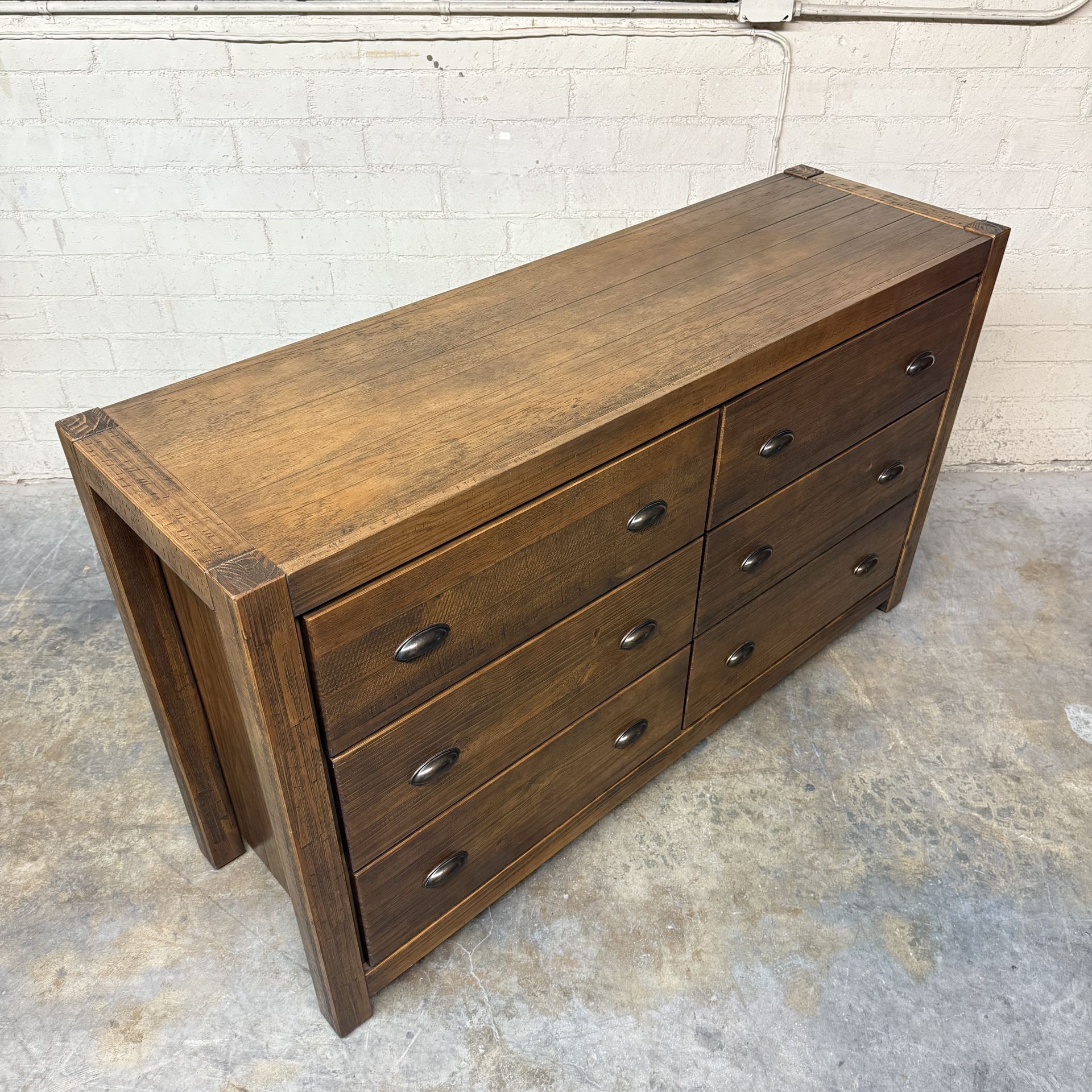 Delivery is available solid wood dresser with 6 storage drawers$390 OBO! 