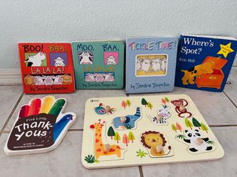 Baby books and first wooden puzzle