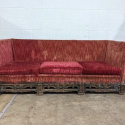 Antique Wooden Couch with Red Cushions