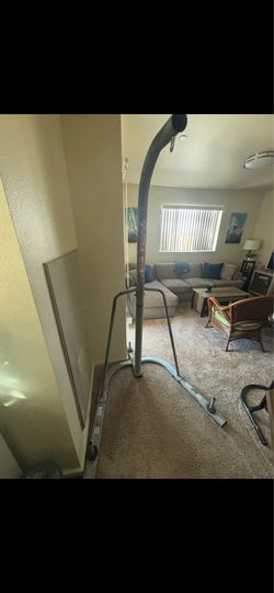 Punching bag stand w/ punching bag (80-90 lbs)