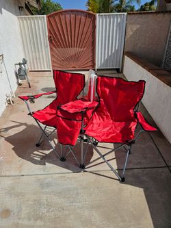 Red folding camping chairs