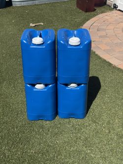 Four 5 Gallon Water Container