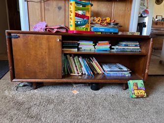 Credenza with sliding door
