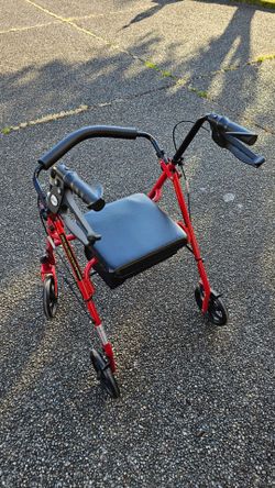 Rolling foldable walker