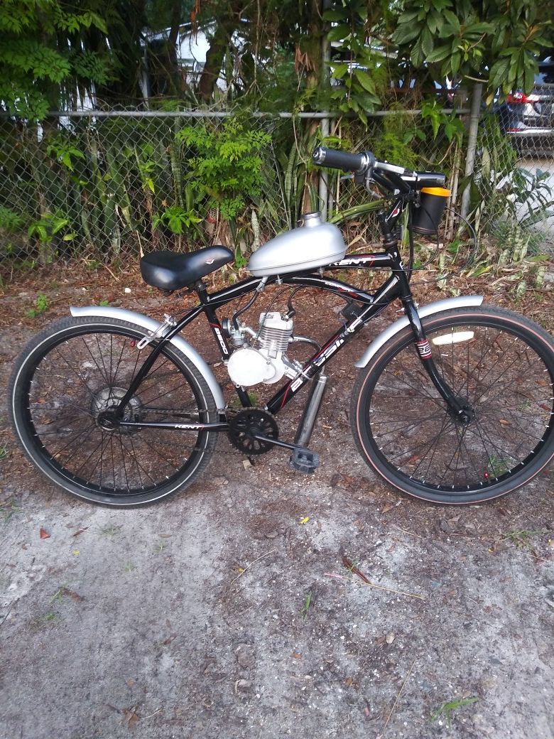 2 stroke gas powered bike runs great comes with two extra tires