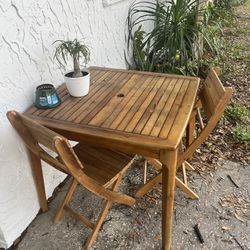 Patio Table And Two Folding Chairs