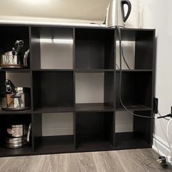 12 Cube Storage Organizer Shelf.   Size 48”L x 36”H x 11 1/2”W.   Cube size 11”L x 11”W x 11 1/2”Depth. $50  or Best Price. Good Condition. 