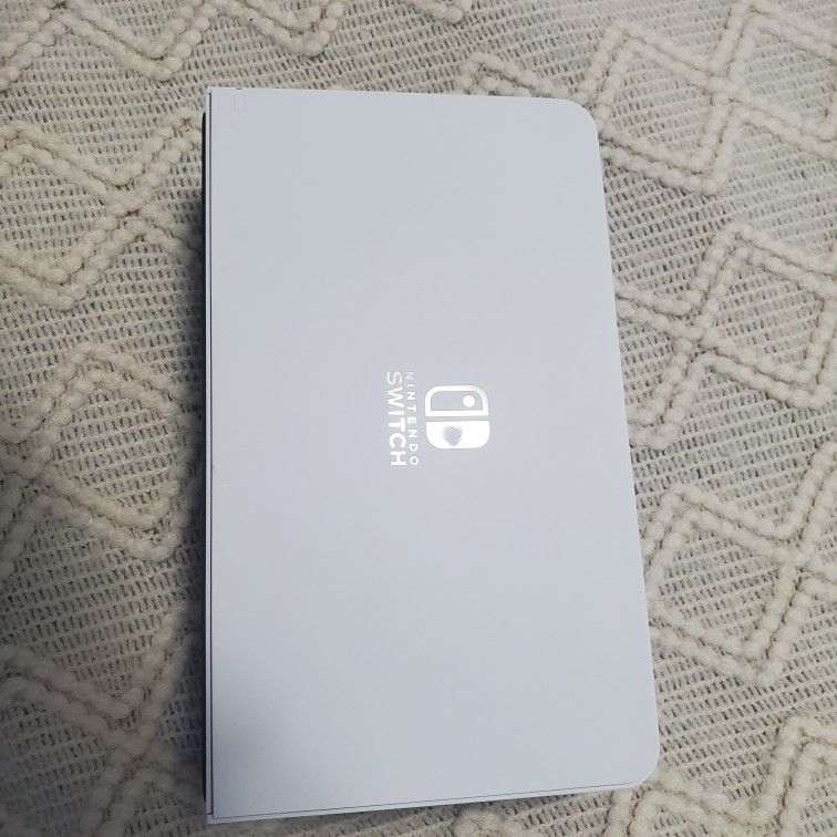 Official Nintendo Switch OLED dock $25 with charger $35