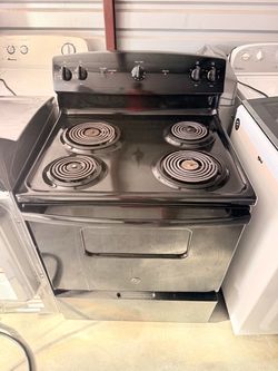 GE 30-in 4 burners 5.0-cu ft Freestanding (Black)