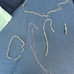 4 Pieces Of Gold 2 Chains And 2 Bracelets 