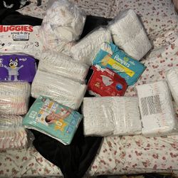 newborn diapers  and 1 can of formula 