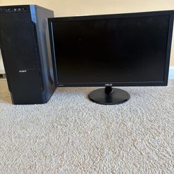 Computer screen and  microatx mini tower.