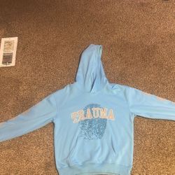 Blue Traumatized Hoodie Size M can Fit a Large 