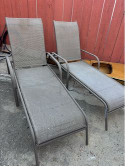 Two outdoor lounge chairs
