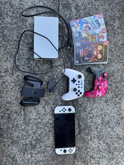 Nintendo switch with games and extra controllers
