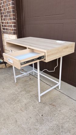 Brand NEW Desk! Never used. Built in with Outlets and USB ports.