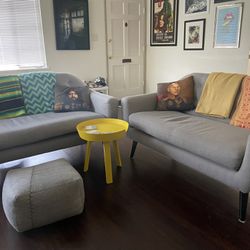 2 x Gray Fabric Two-Seater Sofas - Selling Together Or Individually  $300 Each