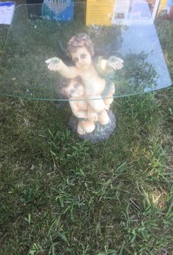 Antic angel glass ceramic table
