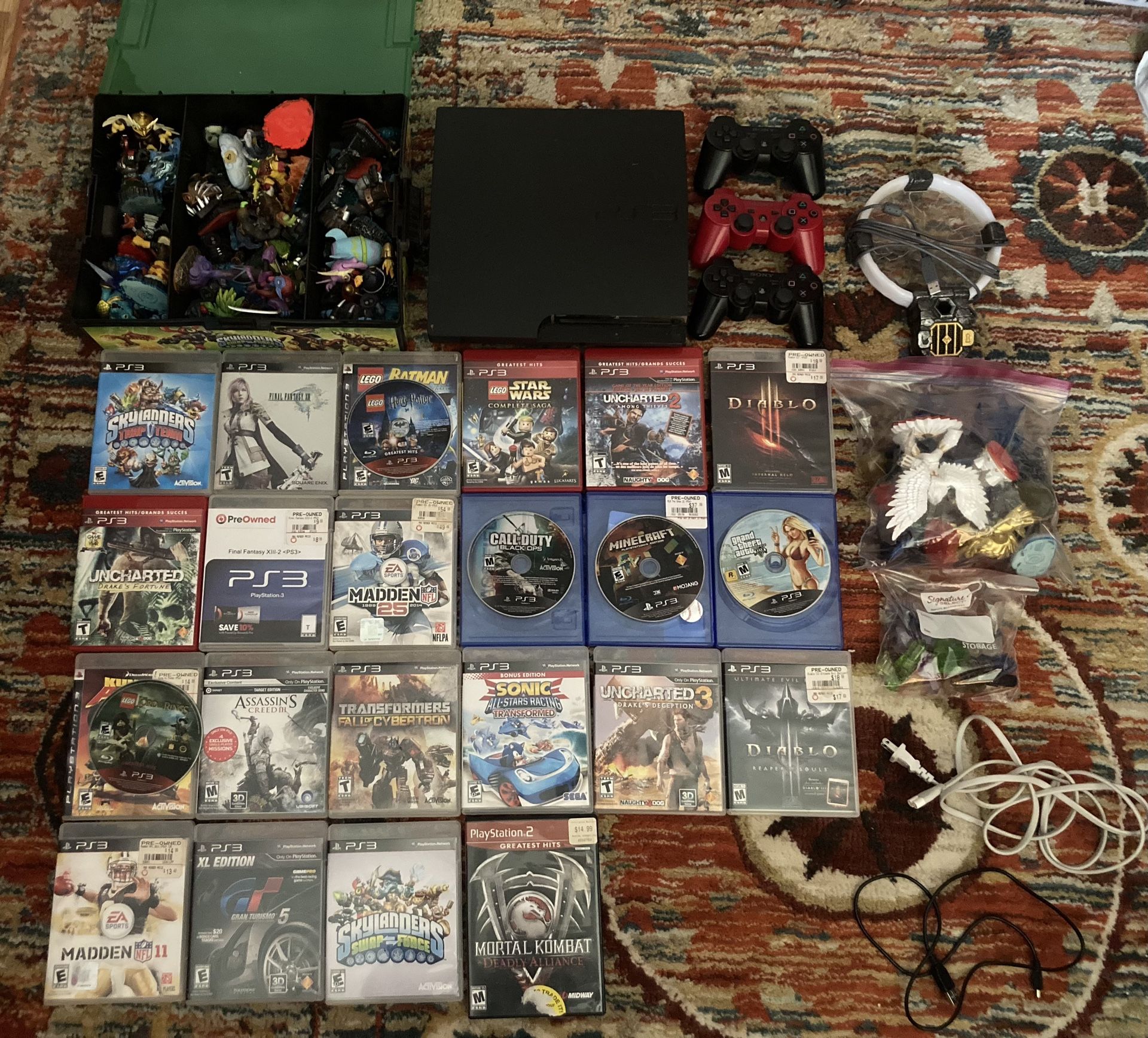 Ps3 lot with lots of games and skylanders