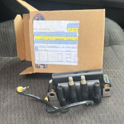 Evinrude  Etec Coil New 