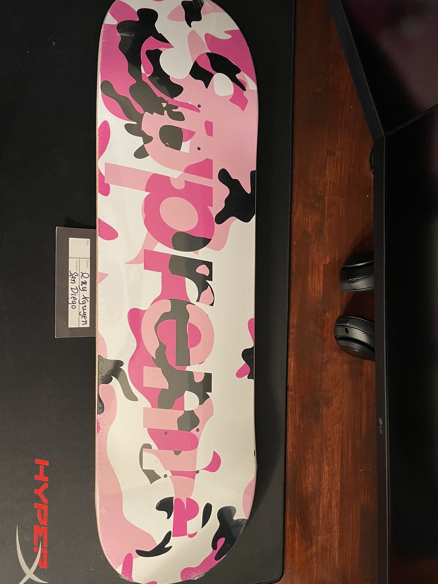 Supreme camo hotsell logo skateboard