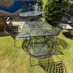 Wrought iron table and four chairs