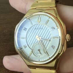 The Bulova Curv Gold PVD Steel Diamond Silver Dial Watch