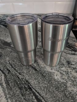 2  stainless steel travel mugs